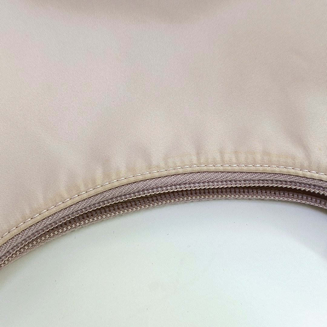 Authenticated pre-owned  Re-Edition Nylon Pink - Top Handle Bag at Looply