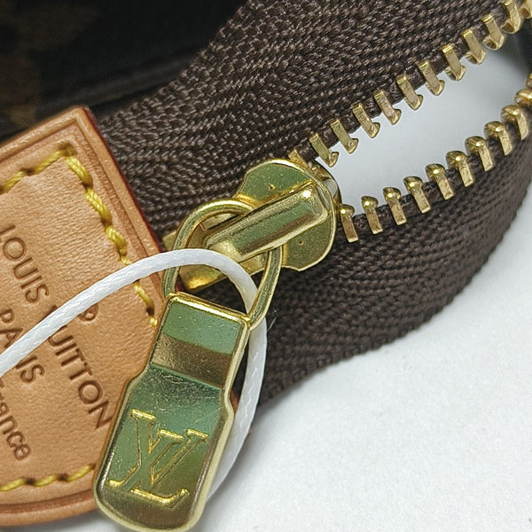 TOILET POCKET 26 Monogram Coated Canvas Brown