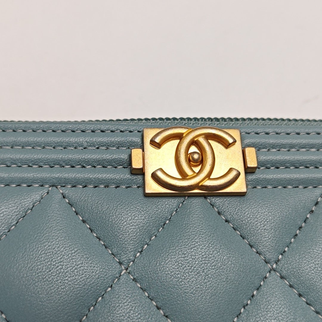 Authenticated pre-owned  BOY CHANEL Quilted Lambskin Blue - Clutch at Looply