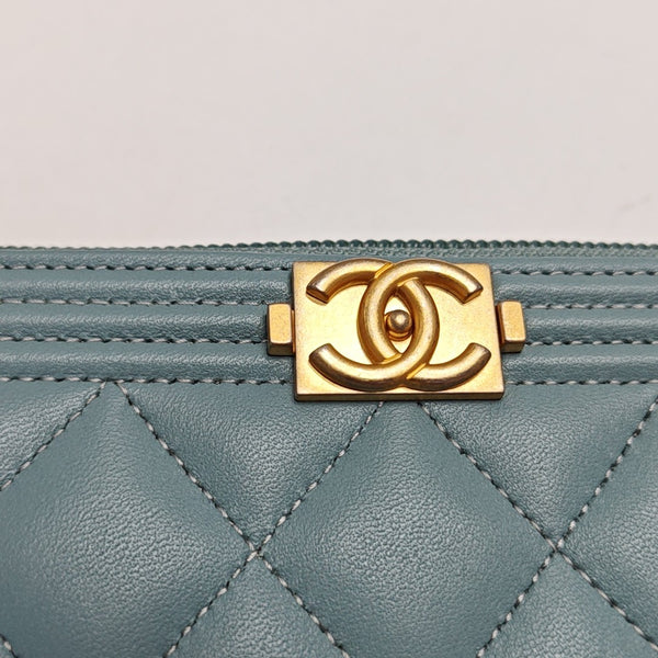 Authenticated pre-owned  BOY CHANEL Quilted Lambskin Blue - Clutch at Looply