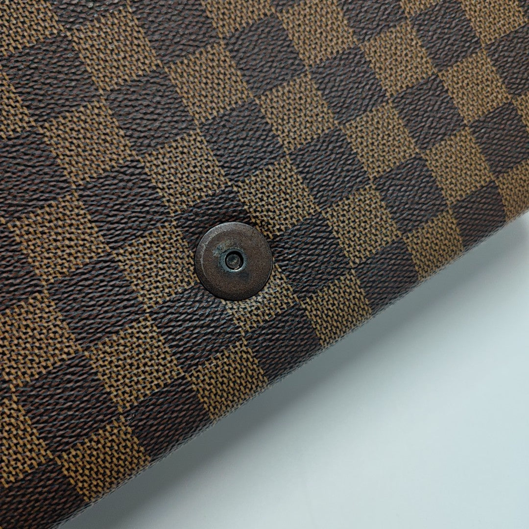 TRIBECA Damier Ebene Coated Canvas Brown