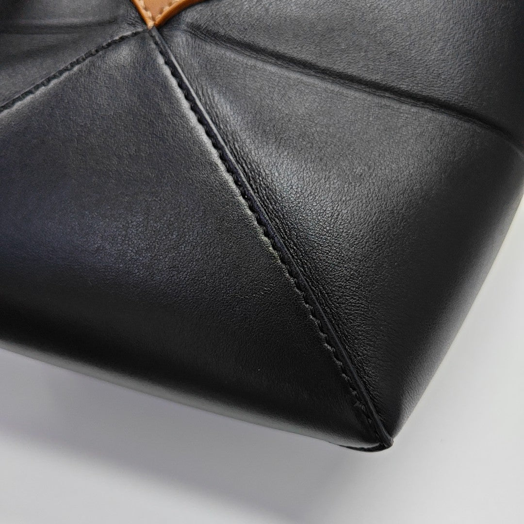 Authenticated pre-owned  Puzzle Fold Mini Calfskin Black - Tote Bag at Looply