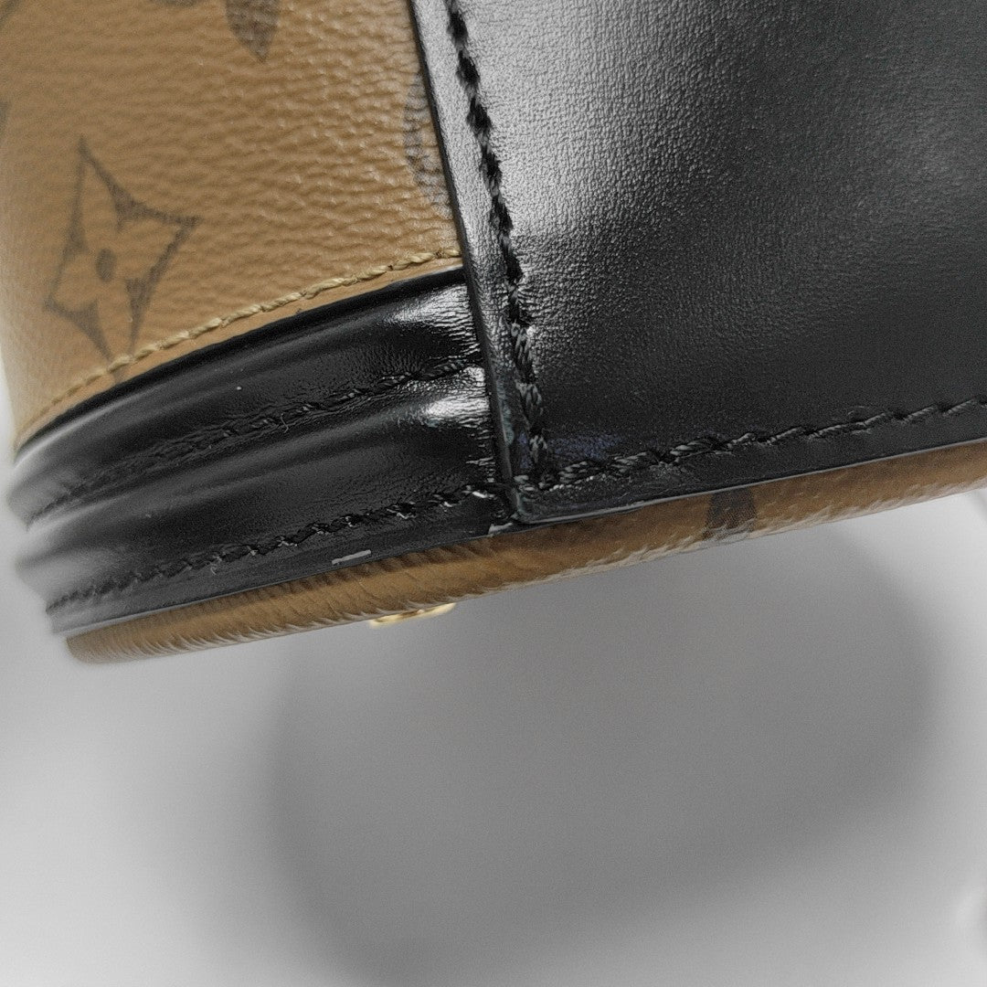 CANNES PM Monogram Coated Canvas Brown