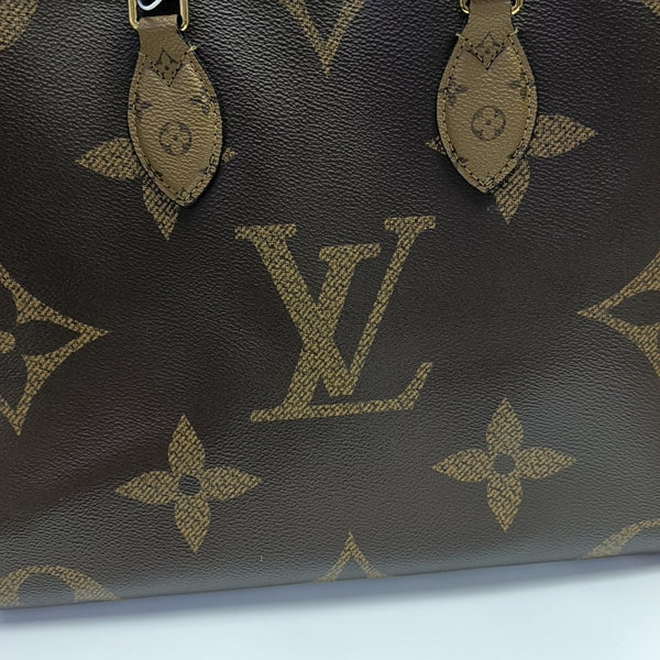 ONTHEGO MM Monogram Coated Canvas Brown