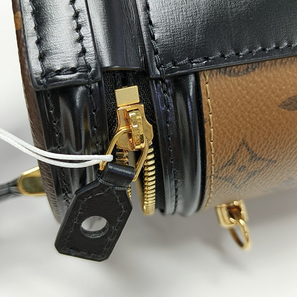 CANNES PM Monogram Coated Canvas Brown