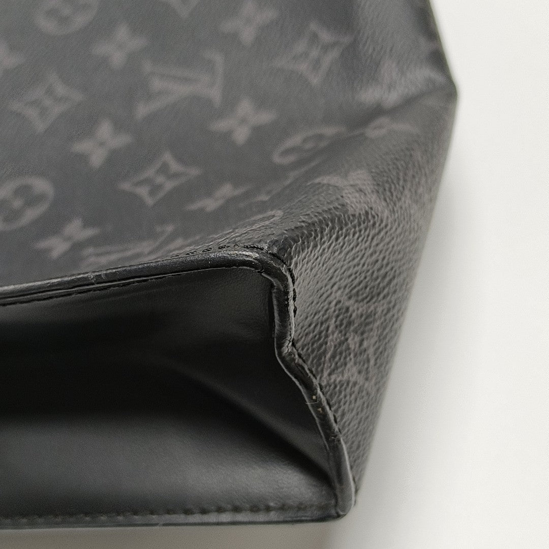 Pochette Voyag MM Monogram Coated Canvas Black