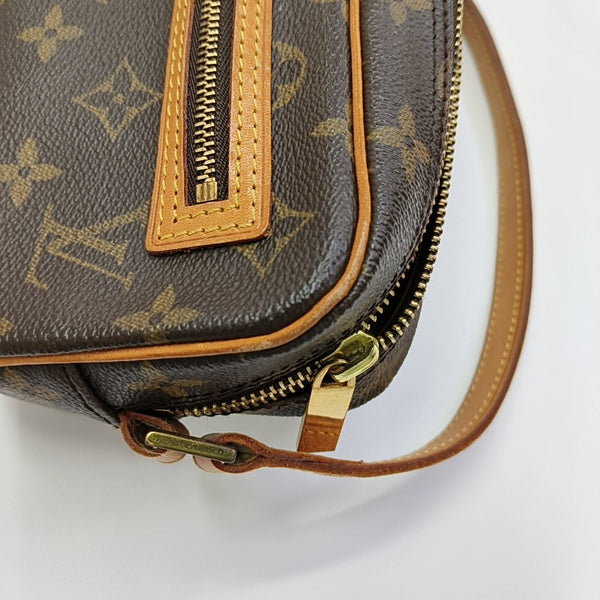 CITE PM Monogram Coated Canvas Brown