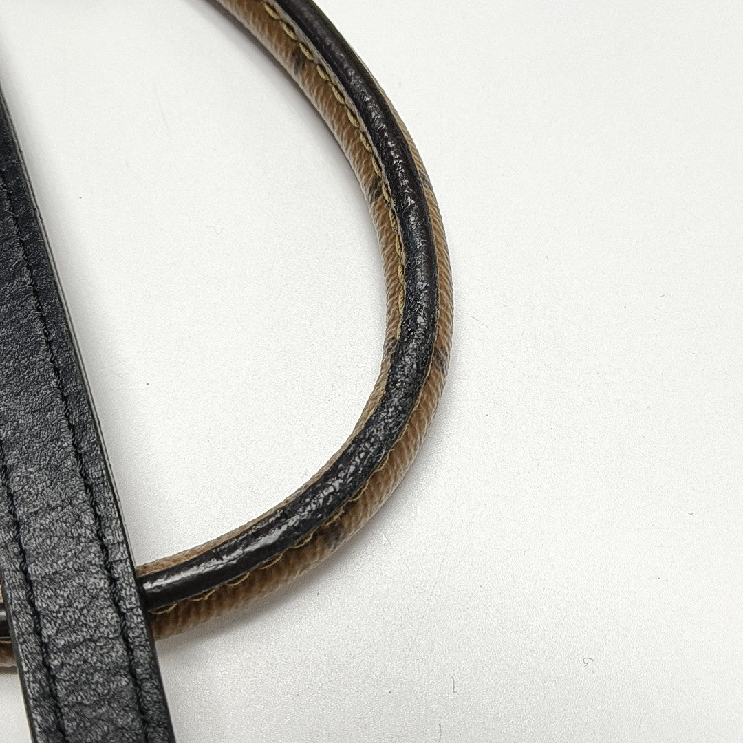 ONTHEGO MM Monogram Coated Canvas Brown
