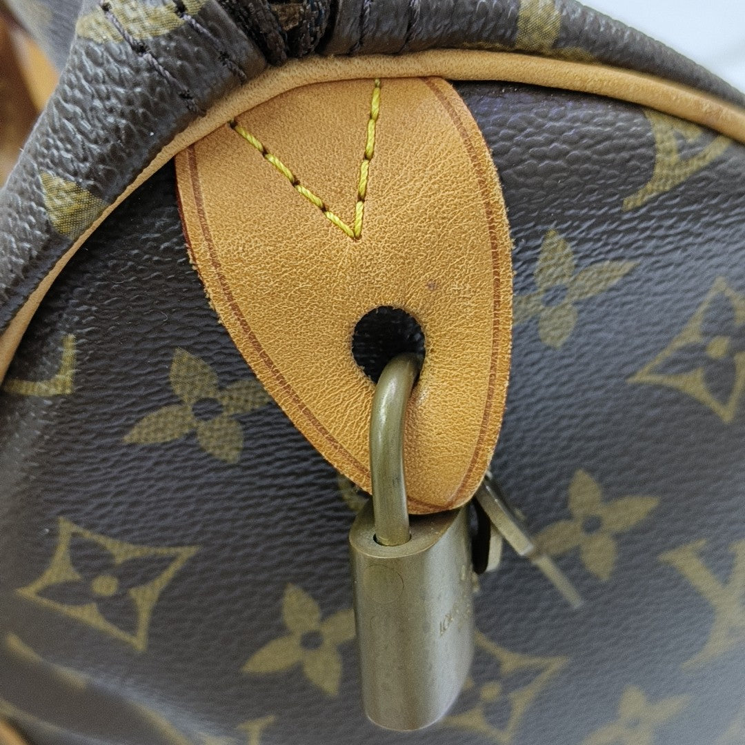 SPEEDY 35 Monogram Coated Canvas Brown
