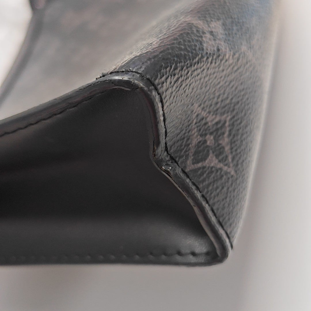 Pochette Voyag MM Monogram Coated Canvas Black