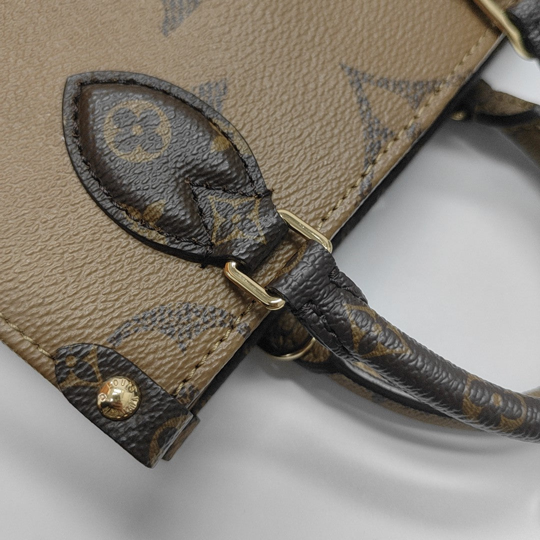 ONTHEGO BB Monogram Coated Canvas Brown