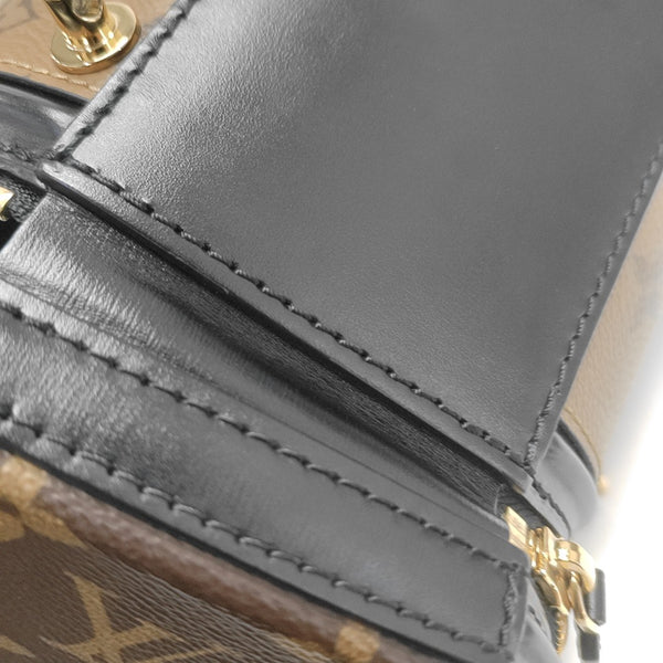 CANNES PM Monogram Coated Canvas Brown