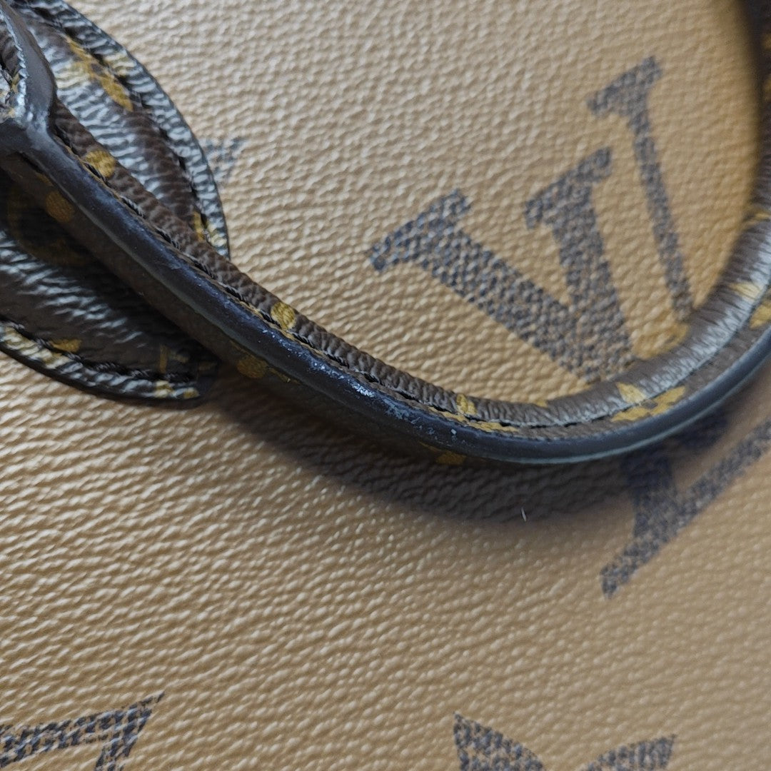 ONTHEGO PM Monogram Coated Canvas Brown