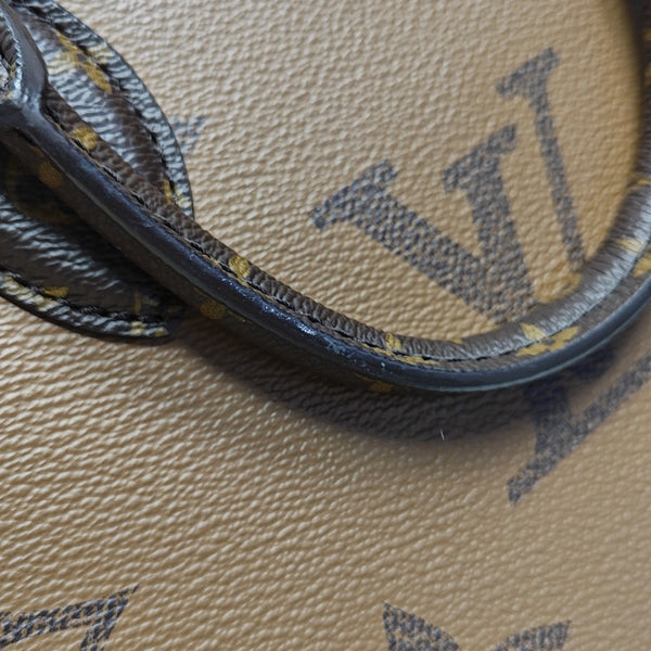 ONTHEGO PM Monogram Coated Canvas Brown