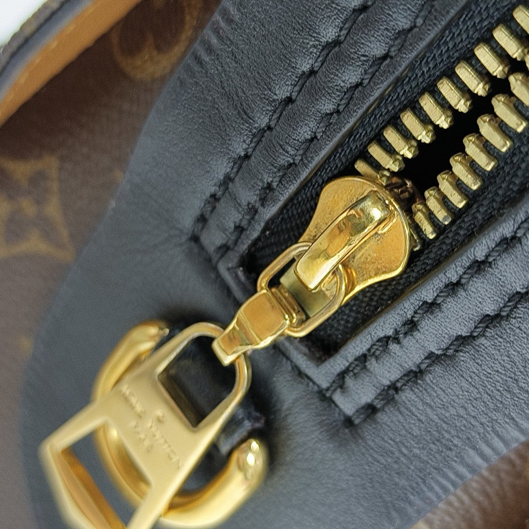 TUILERIES Monogram Coated Canvas Brown