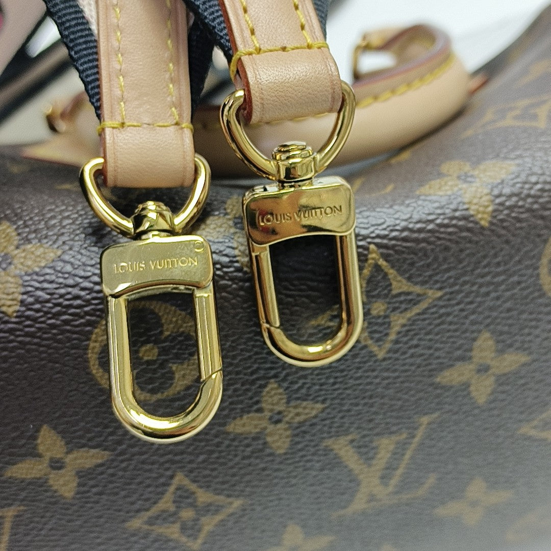 SPEEDY 20 Monogram Coated Canvas Brown