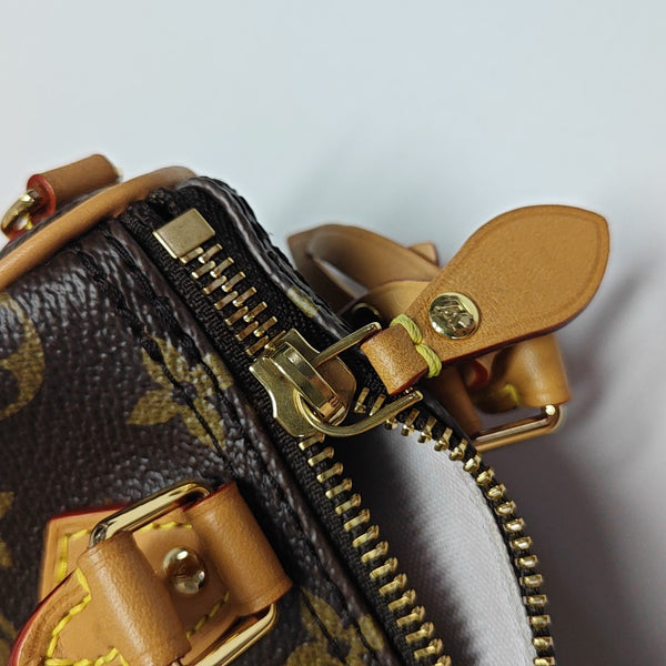 SPEEDY Monogram Coated Canvas Brown