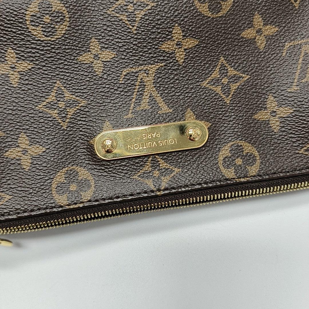 Pochette Eva Monogram Coated Canvas Brown