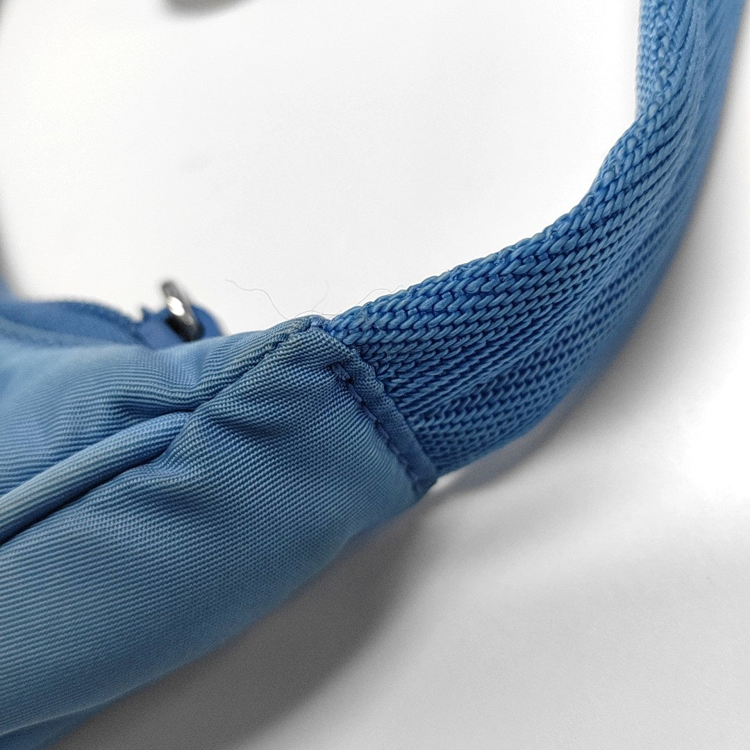 Authenticated pre-owned  Re-Edition2000 Mini Nylon Blue - Top Handle Bag at Looply