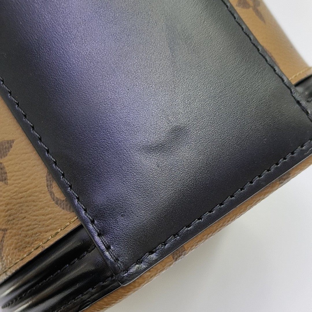 CANNES PM Monogram Coated Canvas Brown