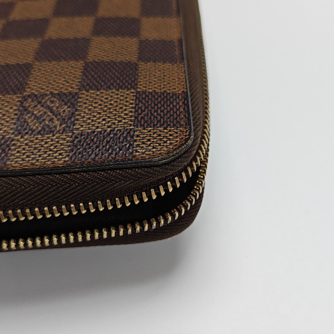 ZIPPY Damier Ebene Coated Canvas Brown Wallet