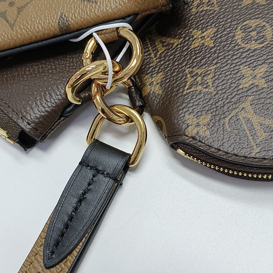 TRIO Monogram Coated Canvas Brown