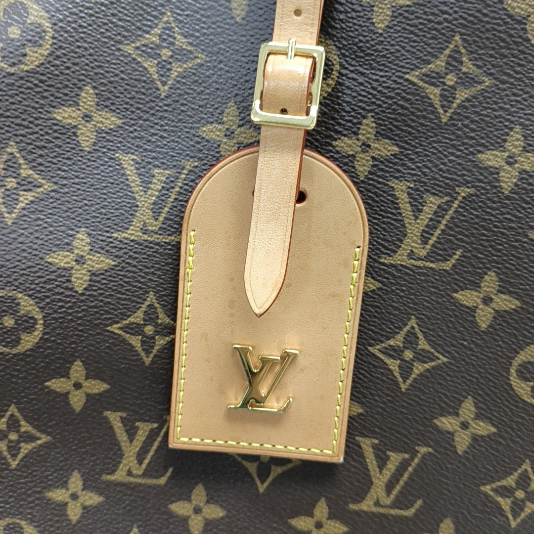 ATLANTIS Monogram Coated Canvas Brown