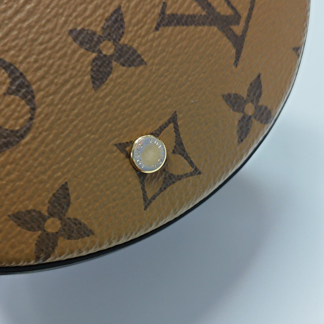 CANNES PM Monogram Coated Canvas Brown