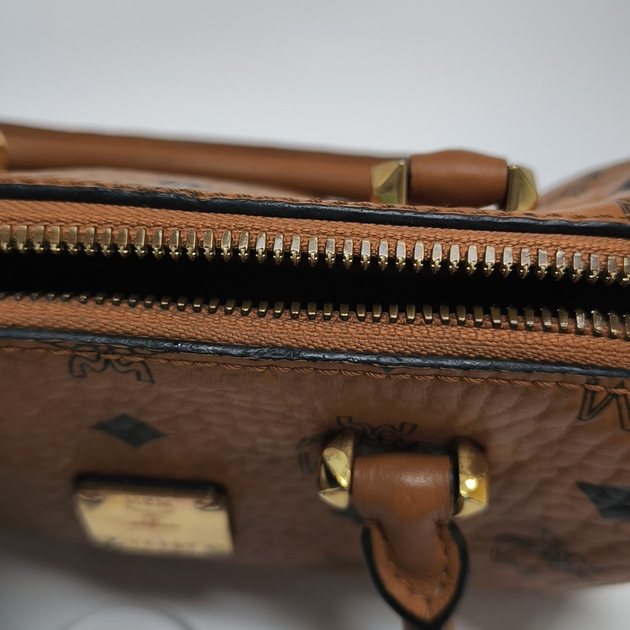 ESSENTIAL Monogram Coated Canvas Brown