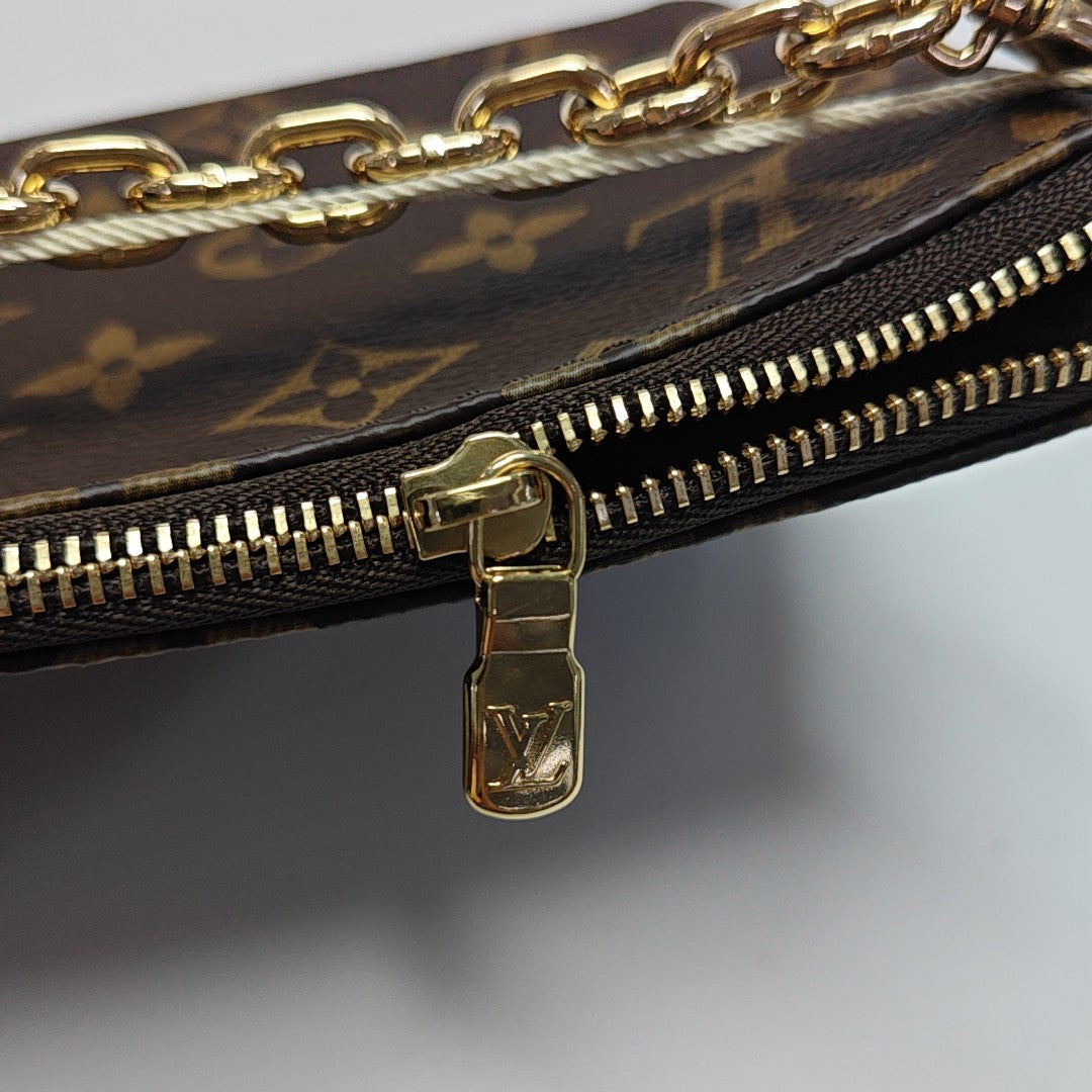 ACCESSOIRES GM Monogram Coated Canvas Brown