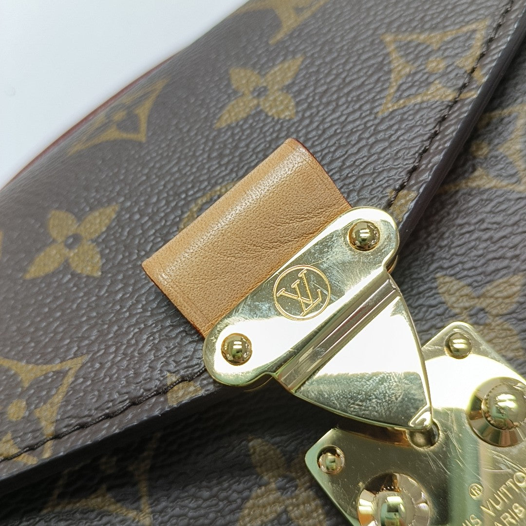 MÉTIS EAST WEST Monogram Coated Canvas Brown