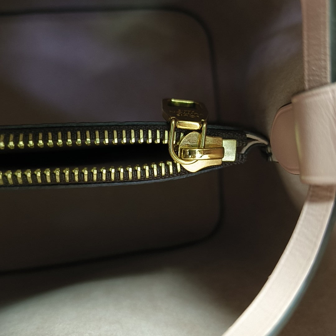 NÉONOÉ MM Monogram Coated Canvas Brown