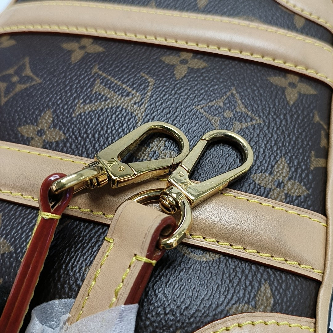 LUGGAGE Monogram Coated Canvas Brown