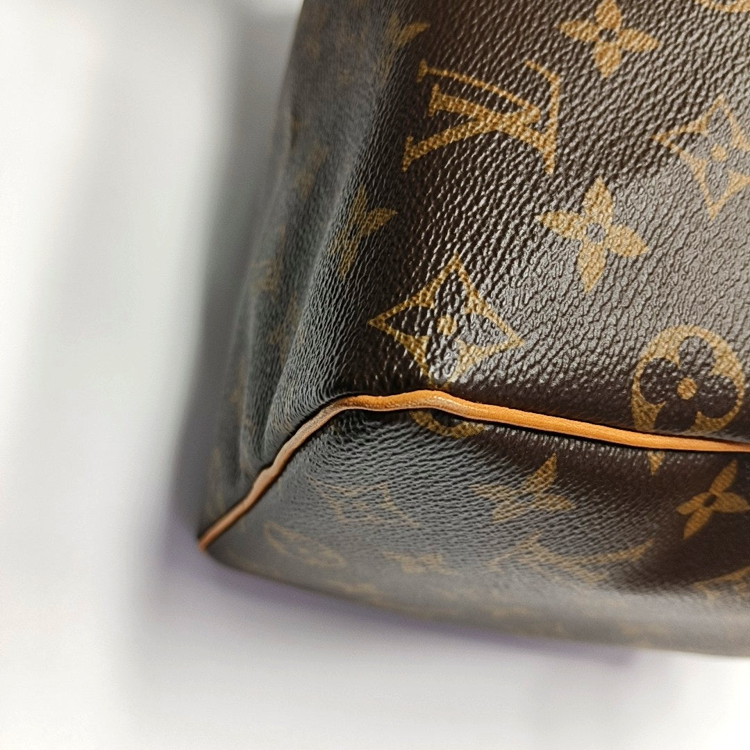 Authenticated pre-owned  SPEEDY 25 Monogram Coated Canvas Brown - Top Handle Bag at Looply