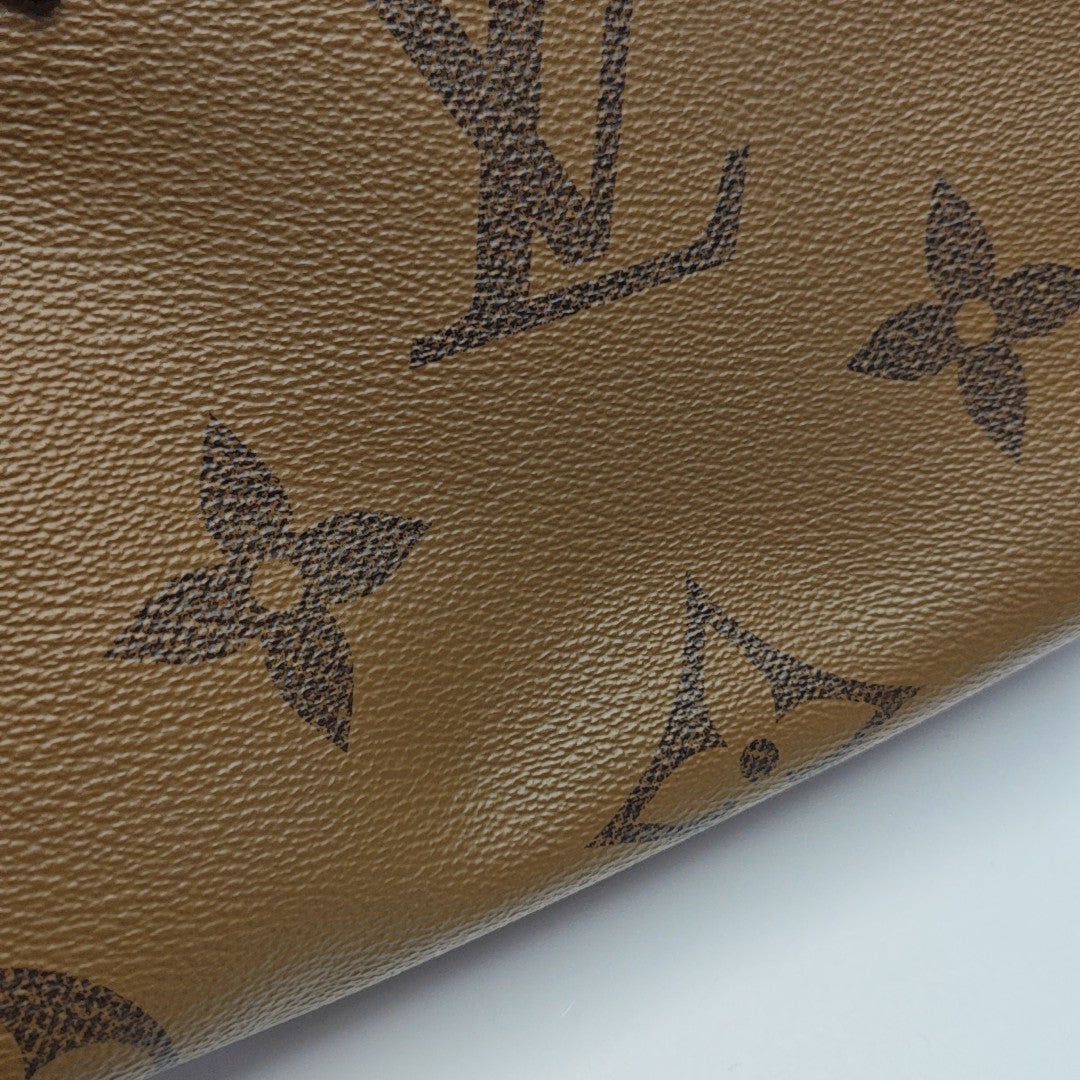 ONTHEGO PM Monogram Coated Canvas Brown