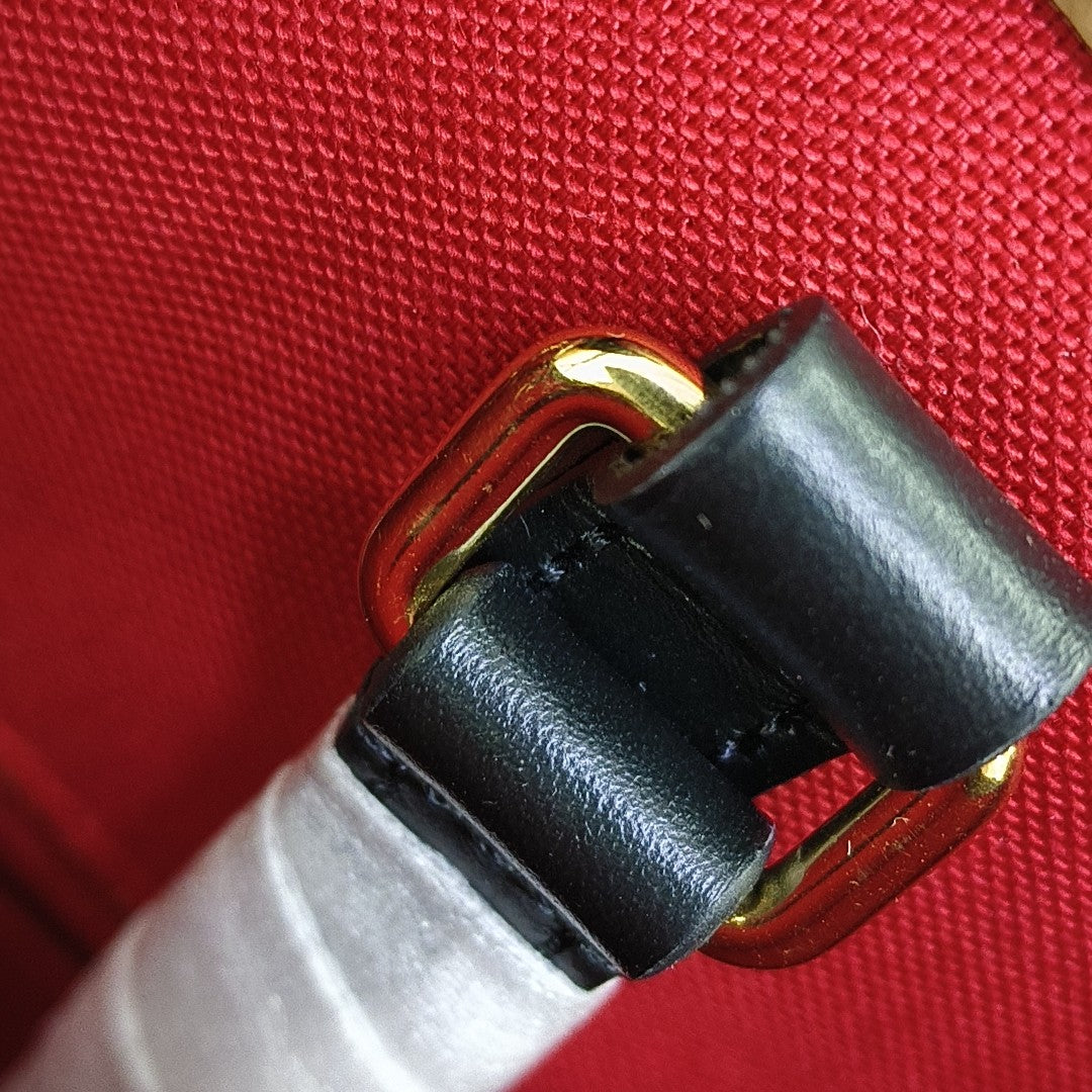ONTHEGO MM Monogram Coated Canvas Brown
