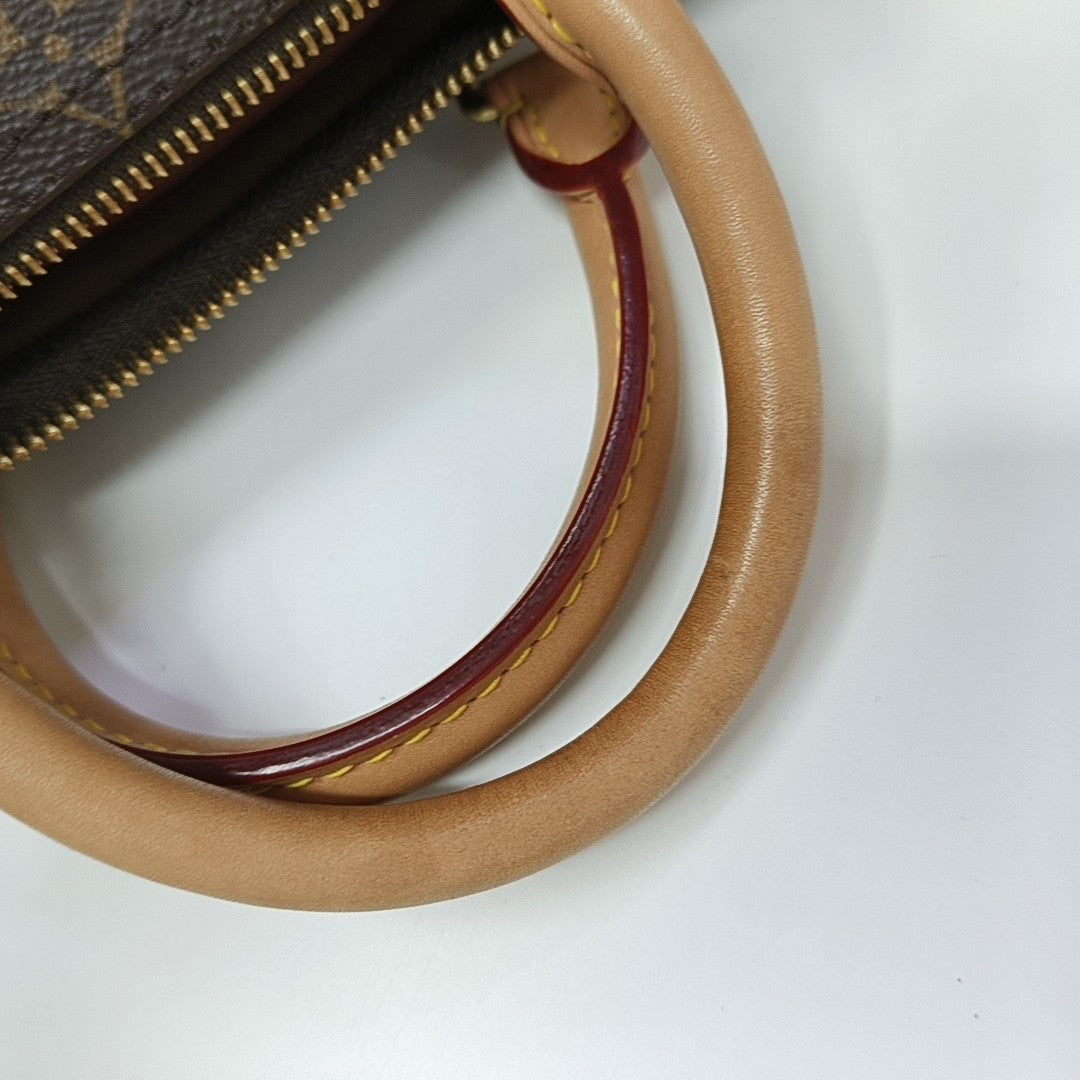 SPEEDY 25 Monogram Coated Canvas Brown