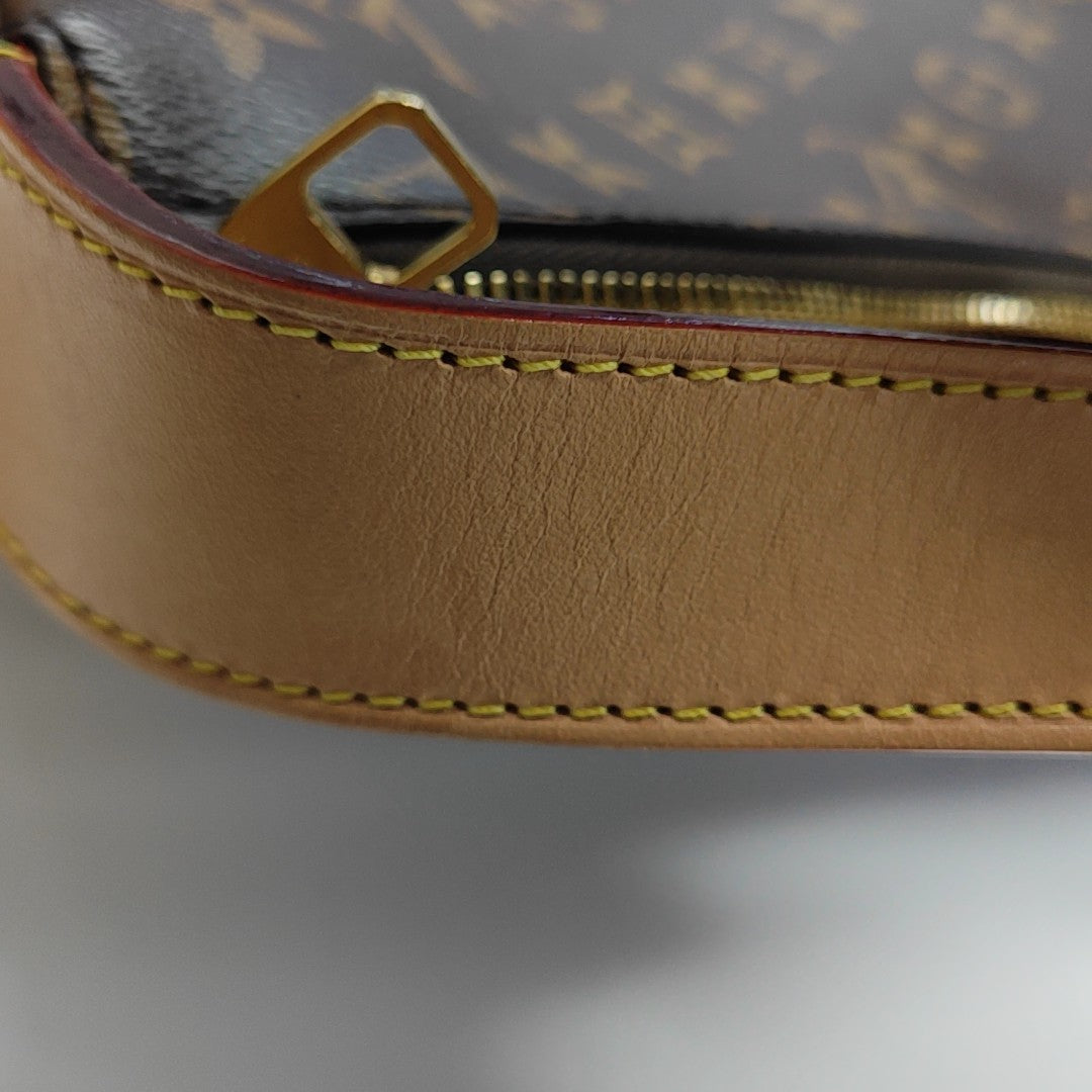 SLOUCHY PM Monogram Coated Canvas Brown