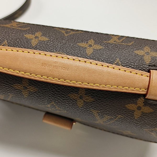 MÉTIS EAST WEST Monogram Coated Canvas Brown