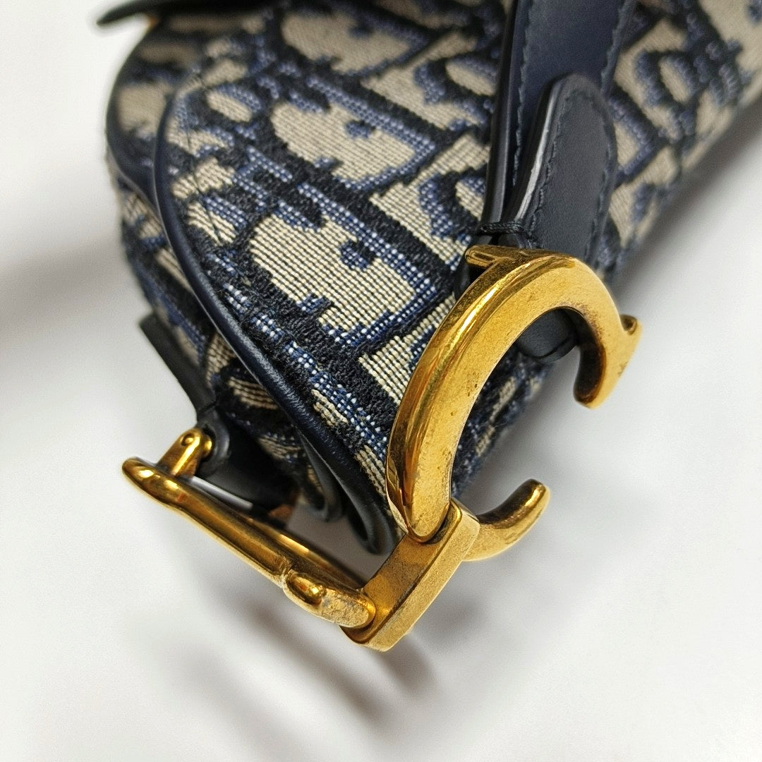 Authenticated pre-owned  Saddle Mini Oblique Canvas Blue - Crossbody Bag at Looply