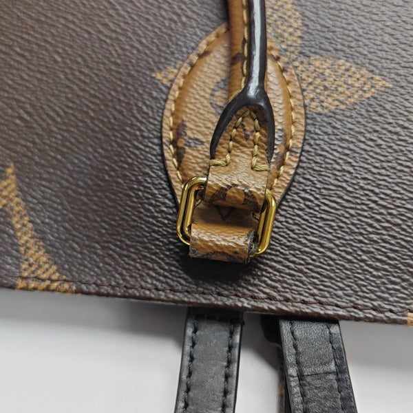 ONTHEGO MM Monogram Coated Canvas Brown