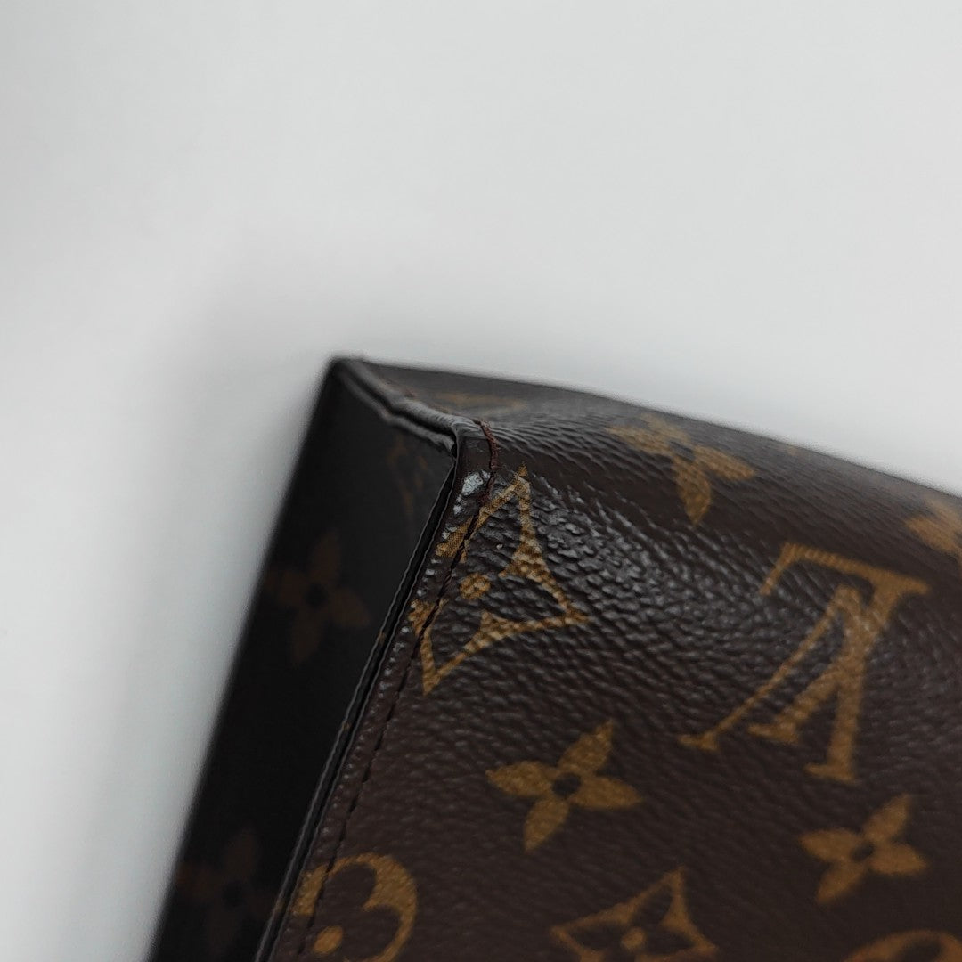 TOILET POCKET 26 Monogram Coated Canvas Brown