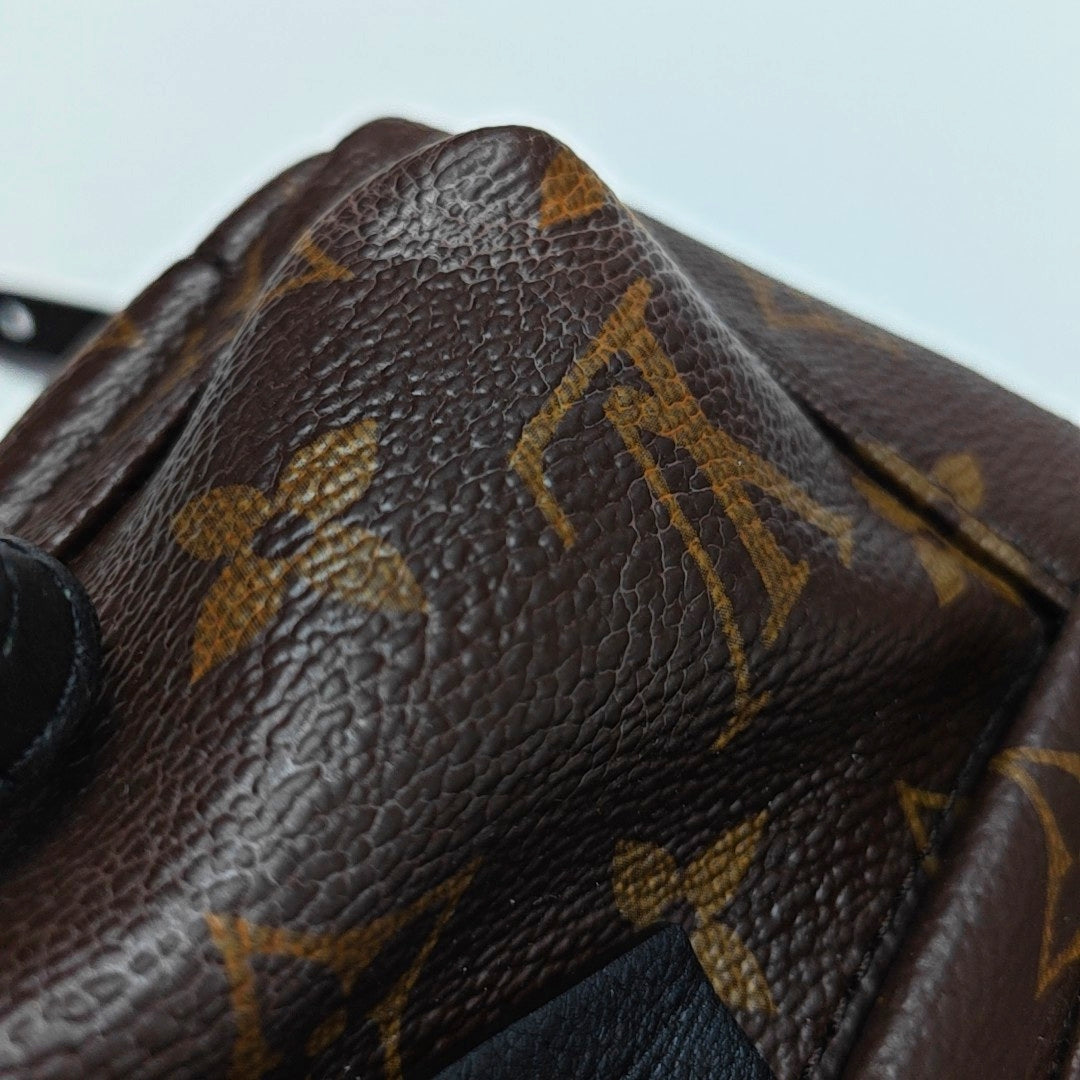 Authenticated pre-owned  PALM SPRINGS Mini Monogram Coated Canvas Brown - Backpack at Looply