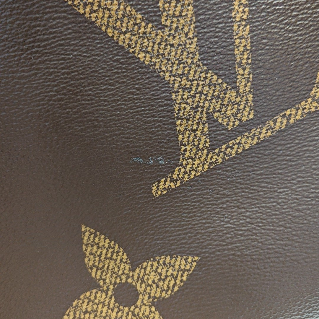 ONTHEGO MM Monogram Coated Canvas Brown