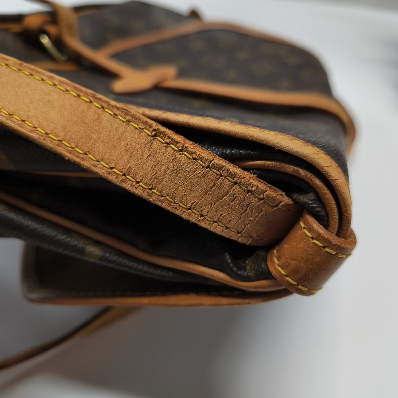 SAUMUR Monogram Coated Canvas Brown