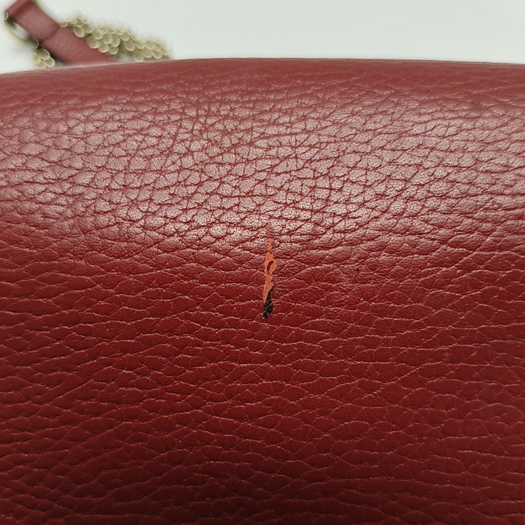 Piel de becerro roja pequeña con GG entrelazadas
