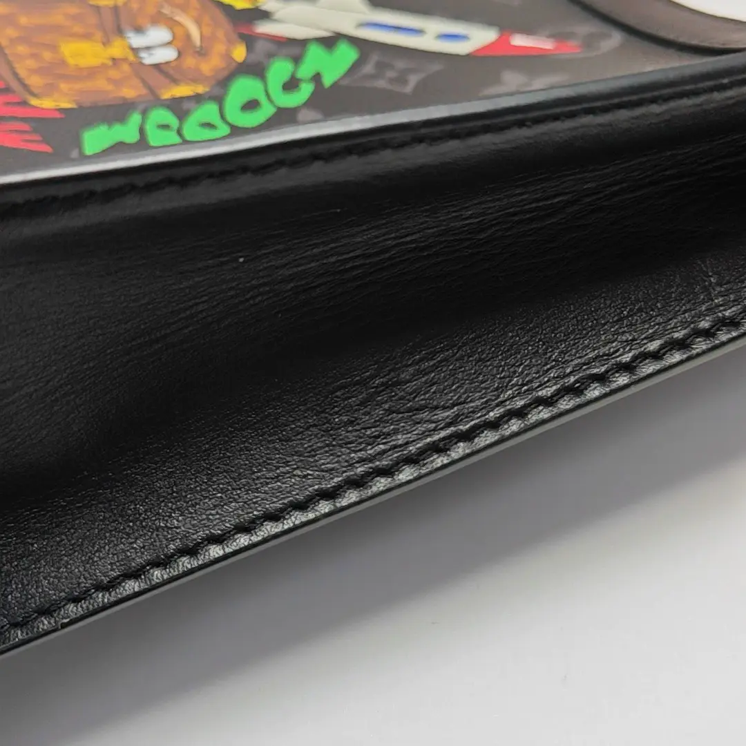 Pochette Voyag MM Monogram Coated Canvas Black