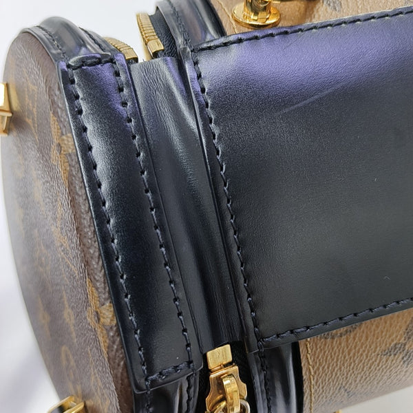 CANNES PM Monogram Coated Canvas Brown
