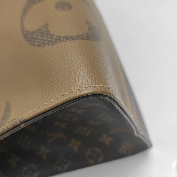 ONTHEGO Monogram Coated Canvas Brown