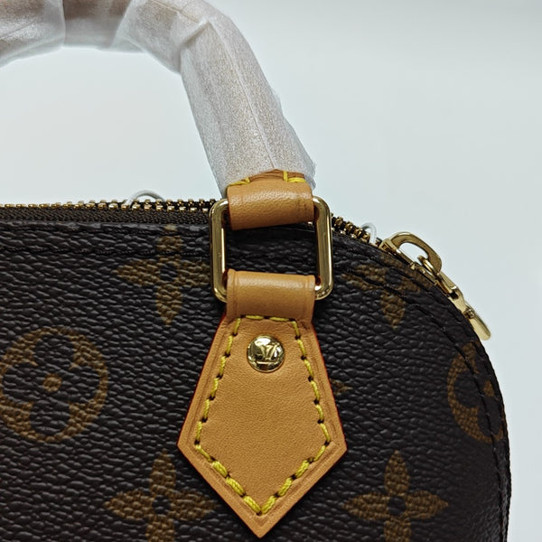 ALMA Mini Monogram Coated Canvas Brown